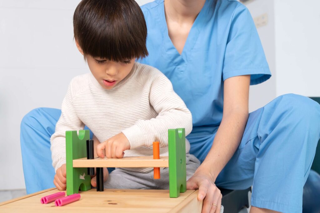 A happy child learning with support